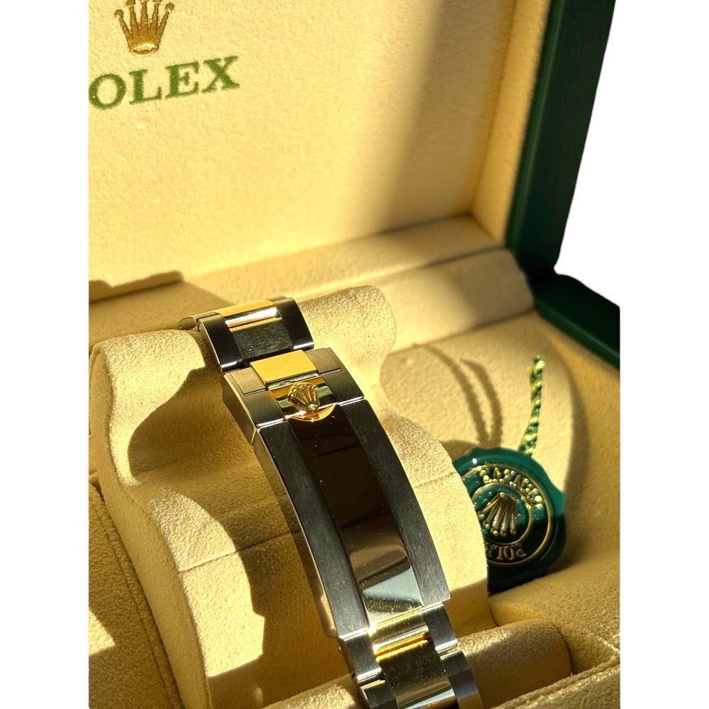 Rolex Submariner Stahl/Gold mit blauem Zifferblatt