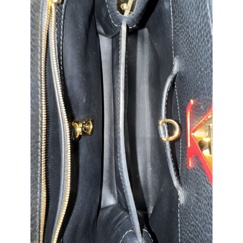 LOUIS VUITTON CAPUCINES FLOWER SMILE